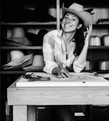 woman modeling cowboy hat