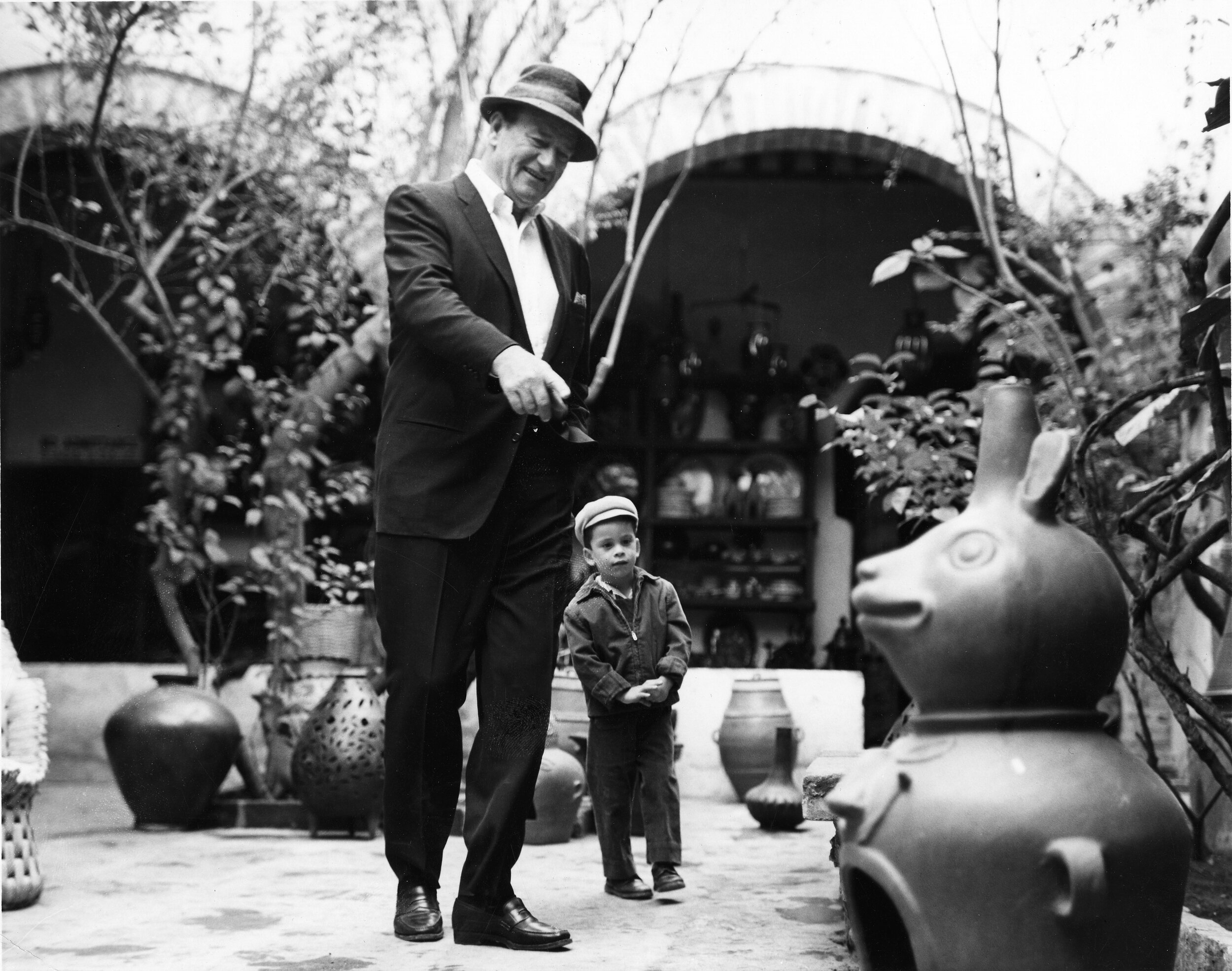 John Wayne and Ethan shopping in Mexico.
