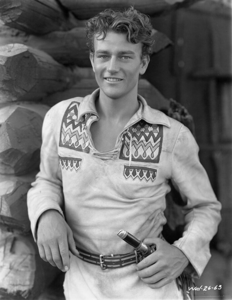 John Wayne leads a pioneer wagon train in The Big Trail (1930)