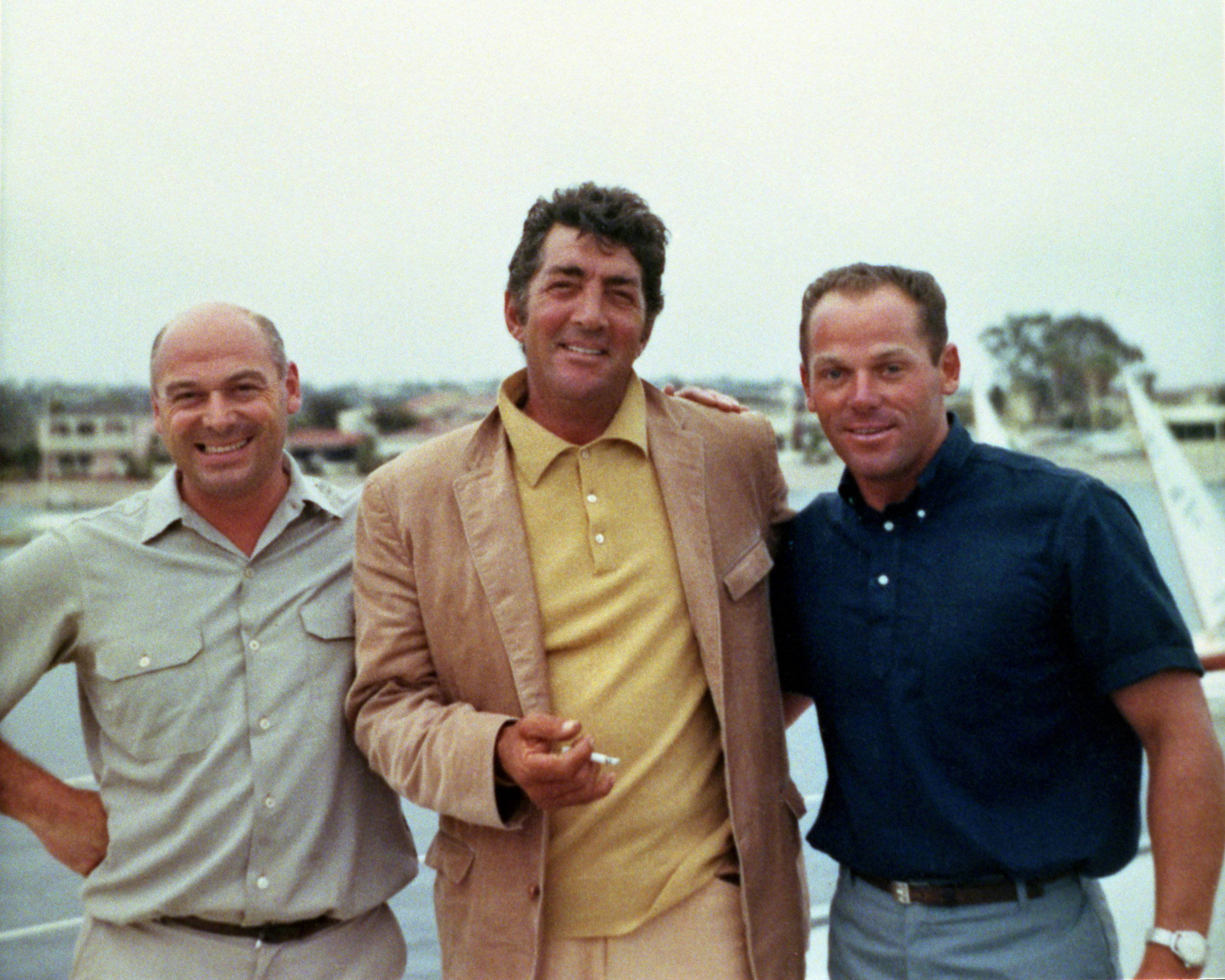 Wild Goose Engineer Ken Minshall, Dean Martin, and Wild Goose Captain Bert Minshall aboard the Wild Goose. Photo courtesy of John Wayne Enterprises