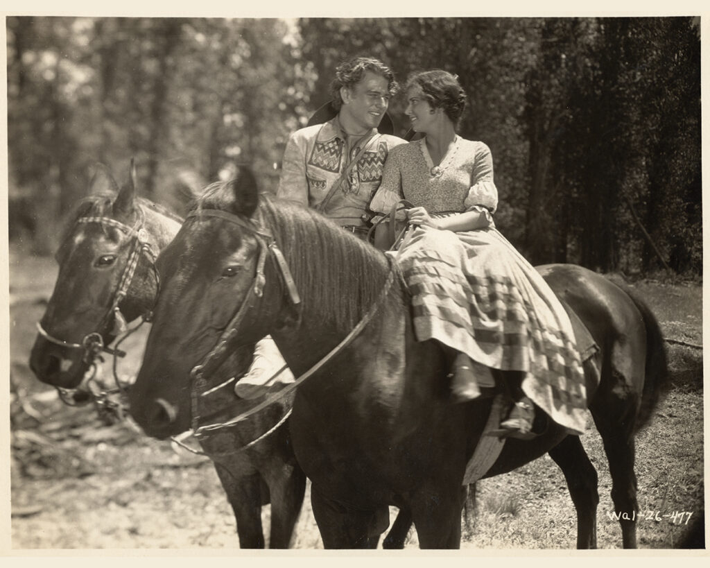 John Wayne as Breck Coleman leads a wagon train in “The Big Trail” (1930)