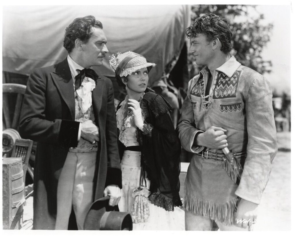 John Wayne as Breck Coleman leads a wagon train in “The Big Trail” (1930)