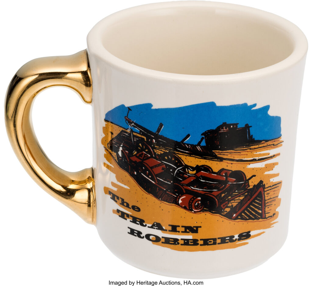 The original Gold Handle Mug from The Train Robbers (1973), gifted by John Wayne to his cast and crew. In July 2025, it sold at auction for $57,500—setting a new benchmark for Hollywood memorabilia.