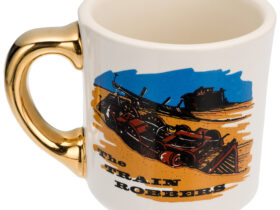 The original Gold Handle Mug from The Train Robbers (1973), gifted by John Wayne to his cast and crew. In July 2025, it sold at auction for $57,500—setting a new benchmark for Hollywood memorabilia.
