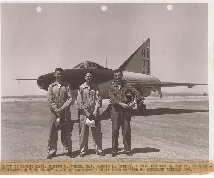 Maj. Chuck Yeager, Capt. Joseph S. Wolfe and Maj. Jackie L. Ridley (right to left) pose beside the mock “MiG-23” used in Jet Pilot at Edwards Air Force Base. (U.S. Air Force/412th Test Wing Archives)